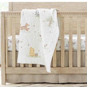 Disney’s Winnie the Pooh Toddler Quilt
Pottery Barn 36”W 50”L 100% Cotton